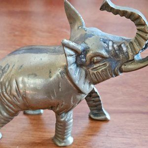 Vintage solid brass trunk up elephant collection made in Taiwan some wear